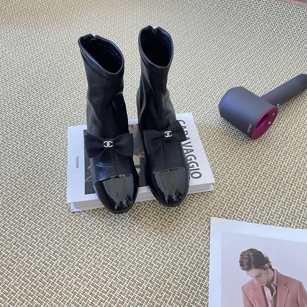 CHANEL Black Leather Ankle Boots with Bow